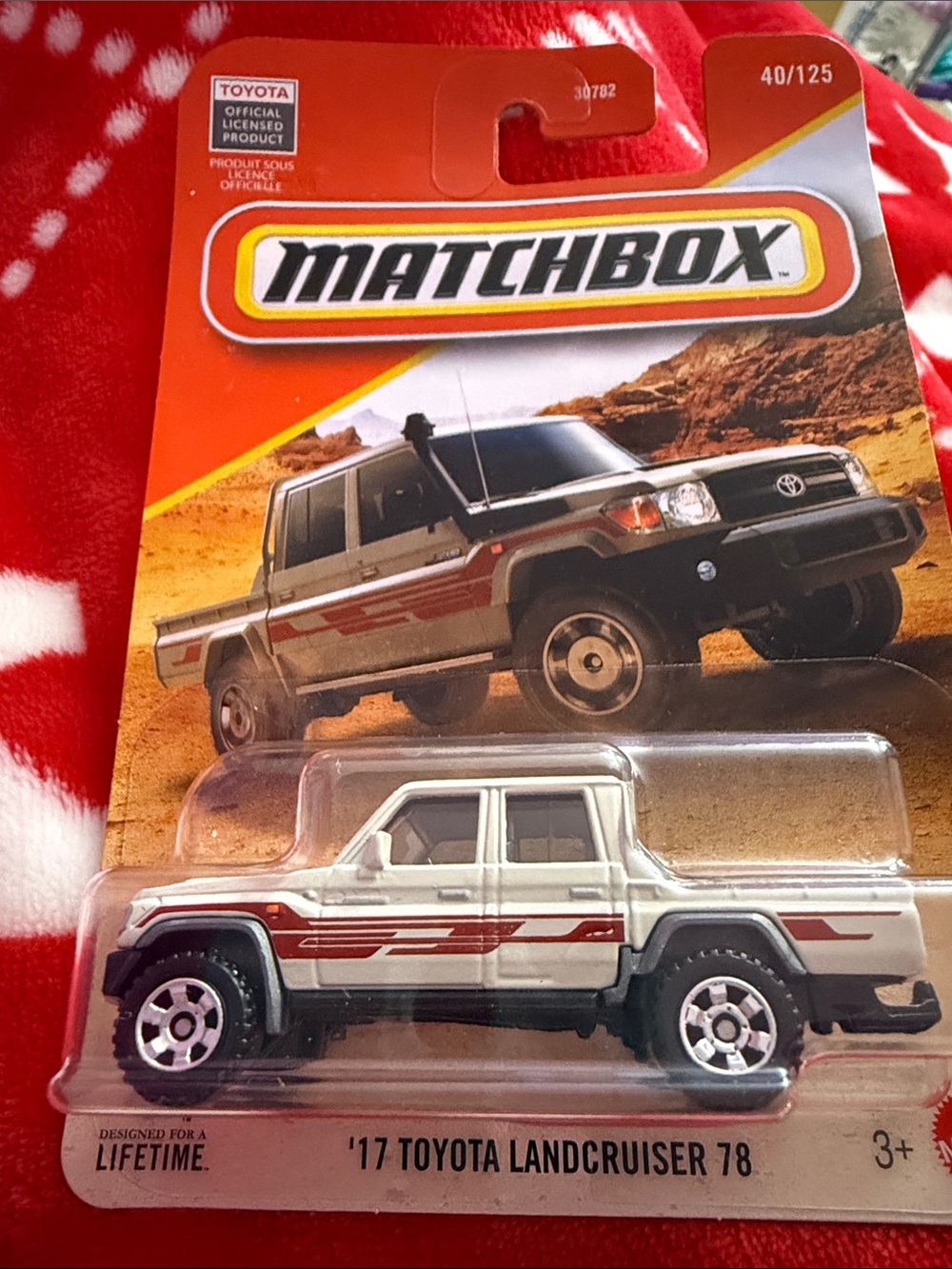 Matchbox White Toyota Land Cruiser 78 Toy Truck with Red Stripes